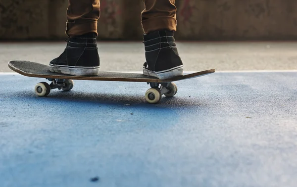 young man riding skateboard