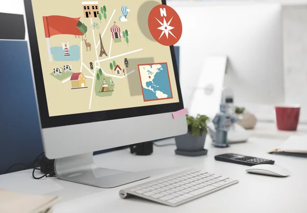 Computer monitor on workplace table — Stock Photo, Image