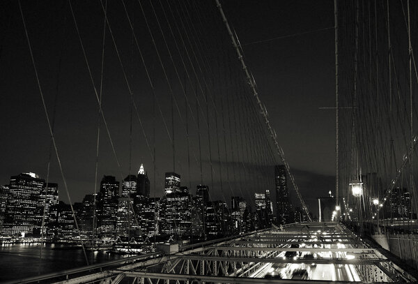 View from the Brooklyn bridge in New York with car traffic . Original photoset