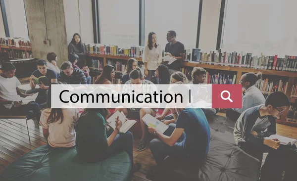 Students reading books in university library — Stock Photo, Image