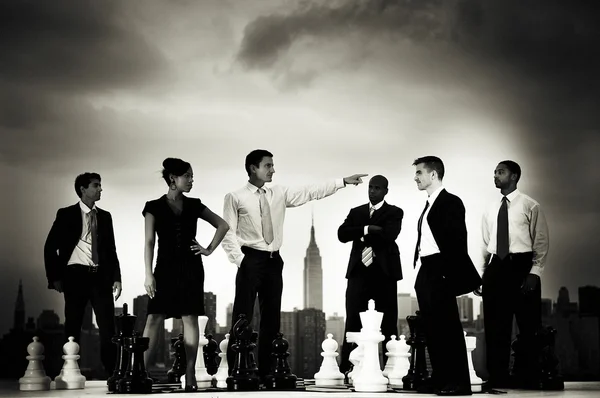 Team of Business People with chess — Stockfoto