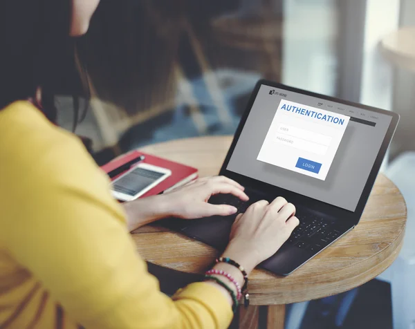 Woman with laptop and phone — Stock Photo, Image