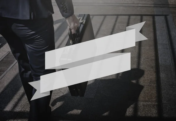 Businessman walking with case — Stock Photo, Image