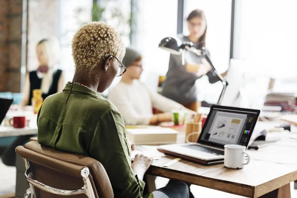 hipsters working in Contemporary office