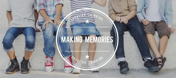 Group of children sitting on bench — Stock Photo, Image