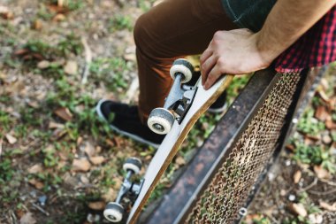 hipster adam holding kaykay