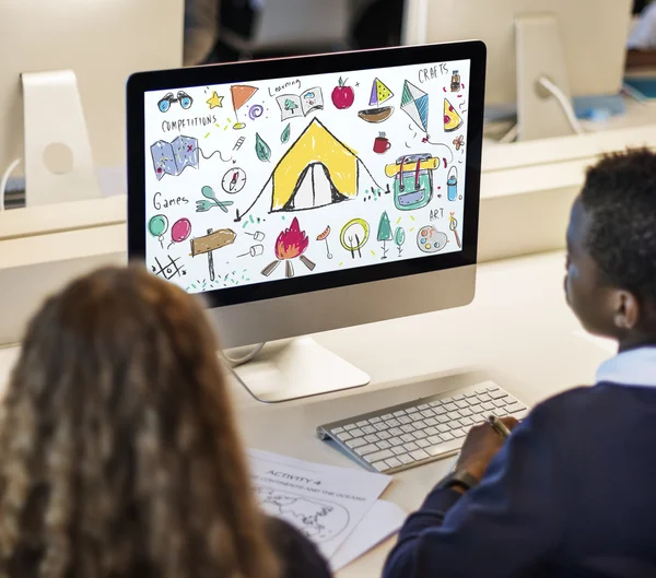 Classmate pupils using computer — Stock Photo, Image