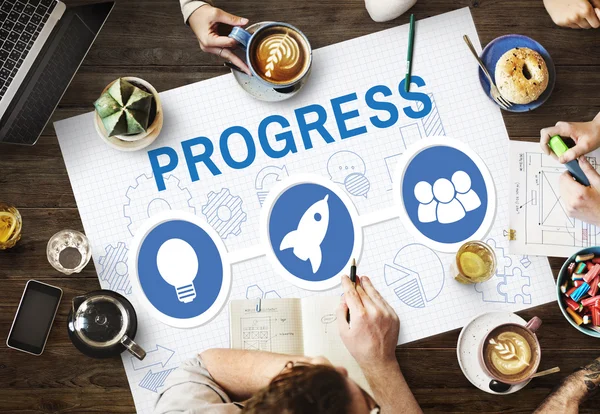 Mesa con póster con concepto de progreso —  Fotos de Stock