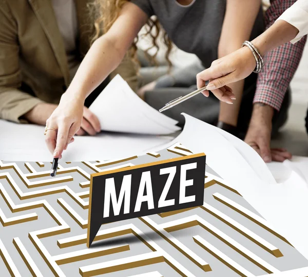 Designers working with poster and Maze — Stock Photo, Image