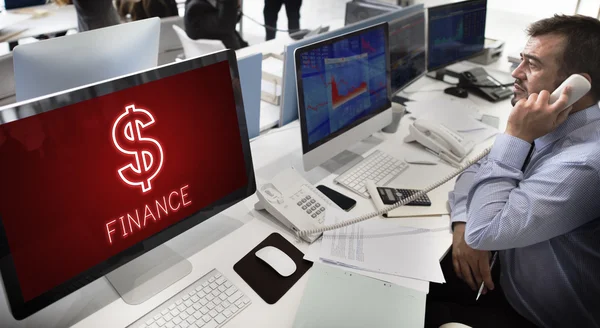 Businessman working on computers with Finance — Stock Photo, Image