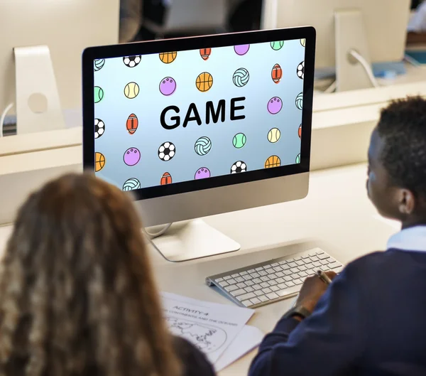 Classmate pupils using computer — Stock Photo, Image