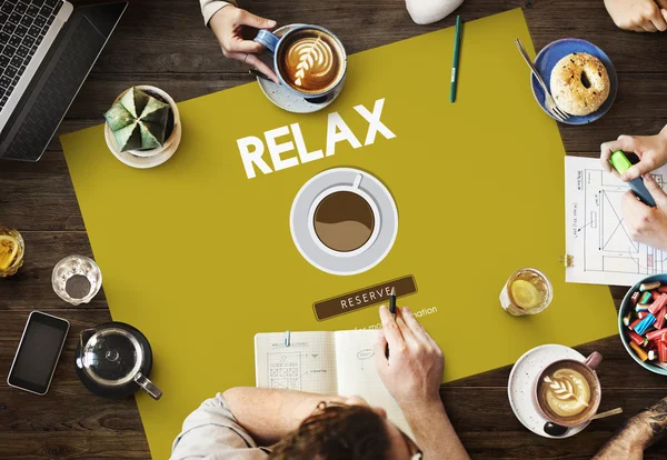 Mesa con póster con concepto relax — Foto de Stock