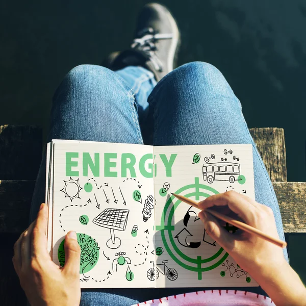 Woman writing in notebook — Stock Photo, Image