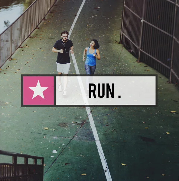 Beautiful sportive couple running — Stock Photo, Image