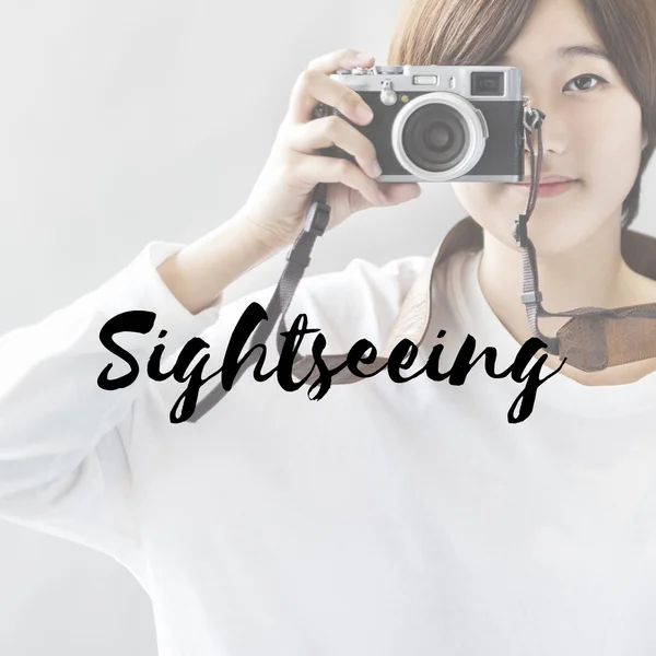 Asian girl with camera — Stock Photo, Image