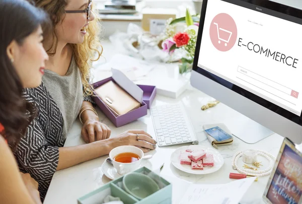 Happy women using computer — Stock Photo, Image