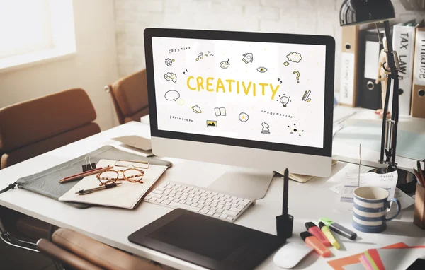 Computer monitor on workplace table — Stock Photo, Image