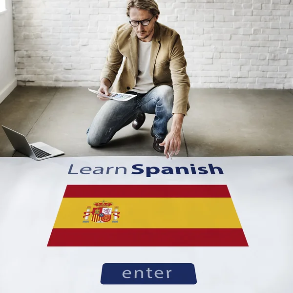 Business man working with Learn Spanish — стоковое фото