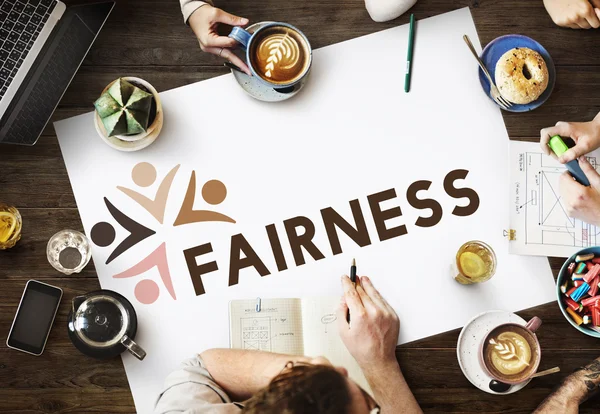 Tavolo con poster con Fairness — Foto Stock