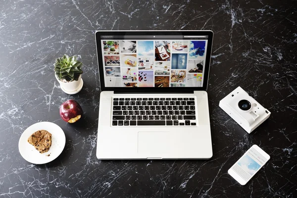 Laptop in design studio — Stock Photo, Image