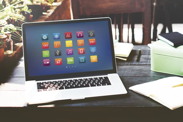 Laptop on wooden workplace table — Stock Photo, Image