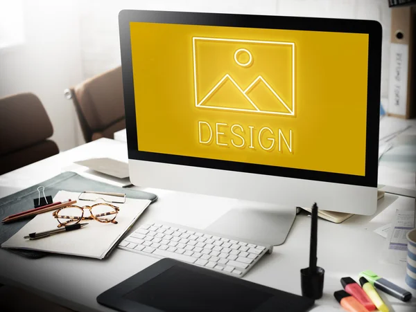 Computer monitor on workplace table — Stock Photo, Image