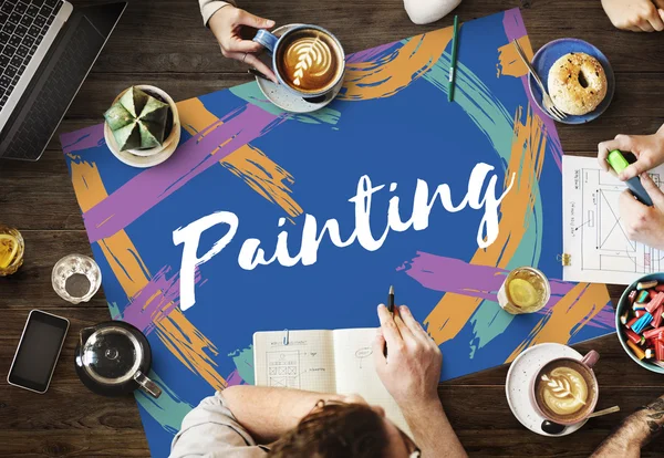 Table with poster with Painting — Stock Photo, Image