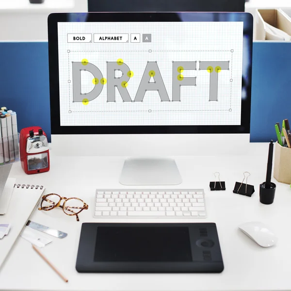 Computer monitor on workplace table — Stock Photo, Image