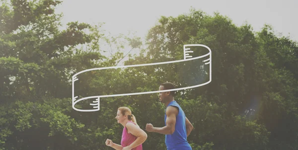 Couple running outdoors — Stock Photo, Image