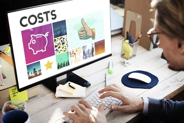 Businessman working on computer with Costs — Stock Photo, Image