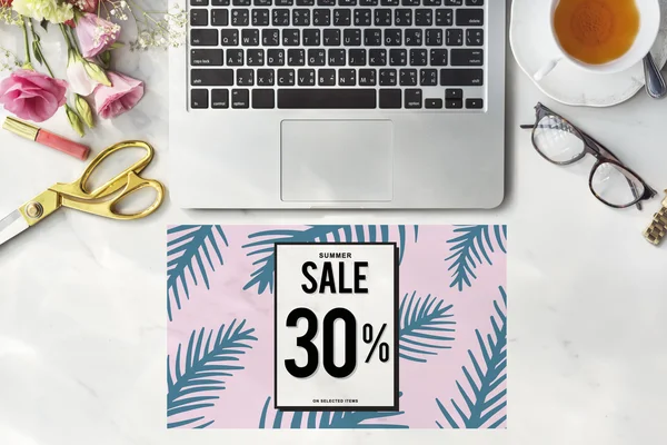 Laptop, sweets and tea on desk — Stock Photo, Image