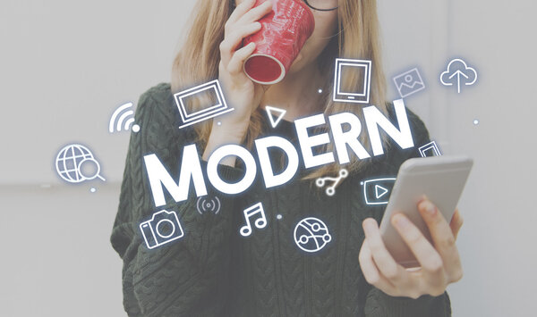 girl with smartphone and cup