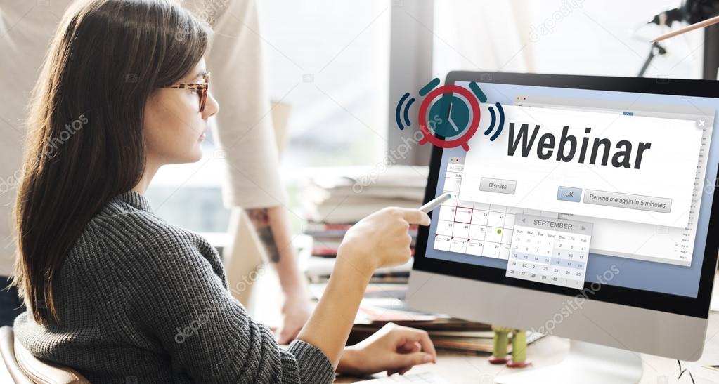 woman showing on monitor with Webinar