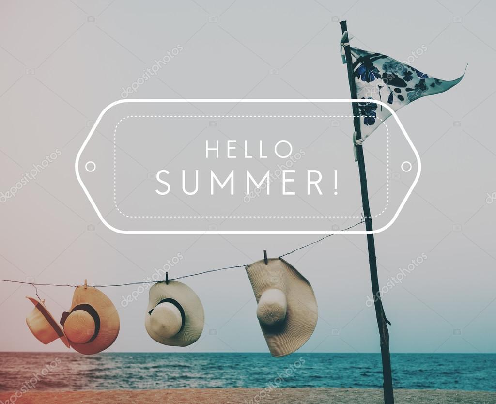 Summer hats on beach, Concept Hello Summer