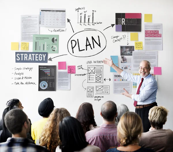 People at seminar with Plan — Stock Photo, Image
