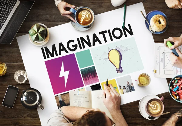 Mesa con póster con Imaginación — Foto de Stock