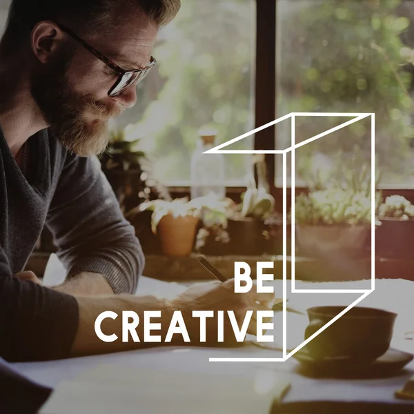 Handsome man writing notes — Stock Photo, Image