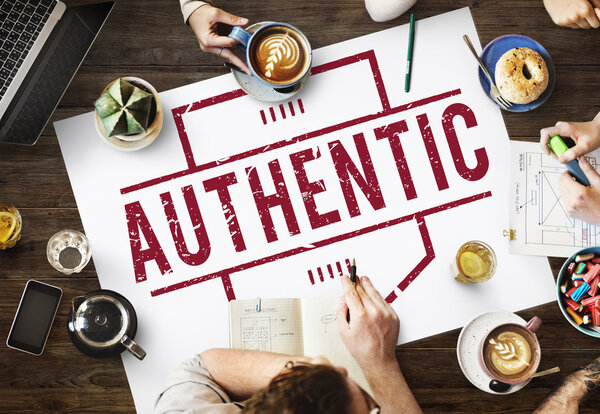 table with poster with Authentic