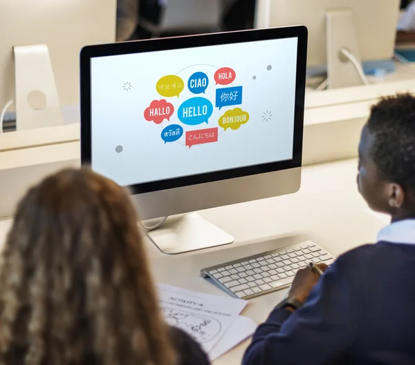 Classmate pupils using computer — Stock Photo, Image