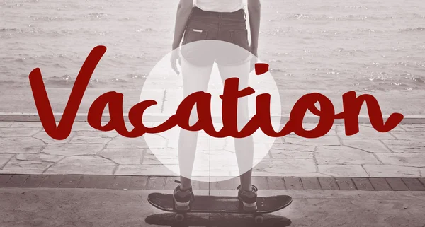 Girl in shorts riding on skateboard — Stock Photo, Image