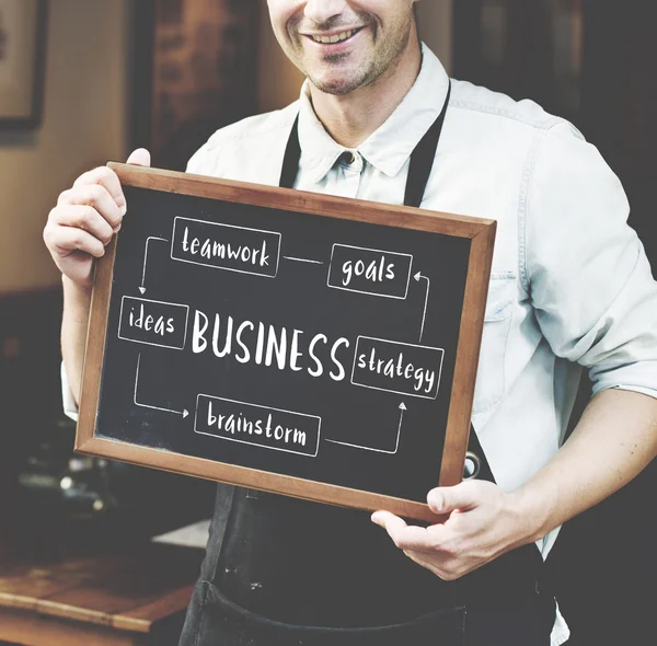 Barista com quadro informativo de madeira — Fotografia de Stock