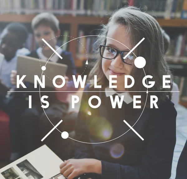 Kids studying at library — Stock Photo, Image