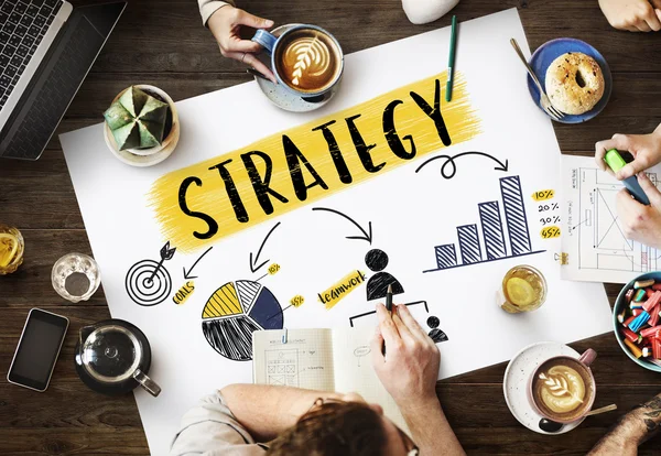 Tabel met poster met strategie — Stockfoto