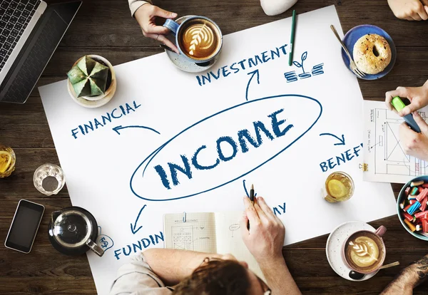 Table with poster with Income — Stock Photo, Image