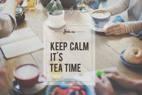 People drinking hot tea at cafe — Stock Photo, Image