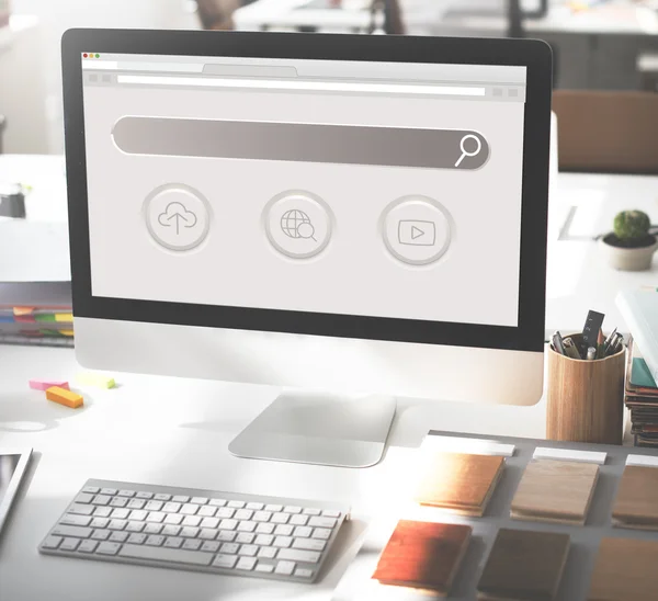 Computer monitor on workplace table — Stock Photo, Image