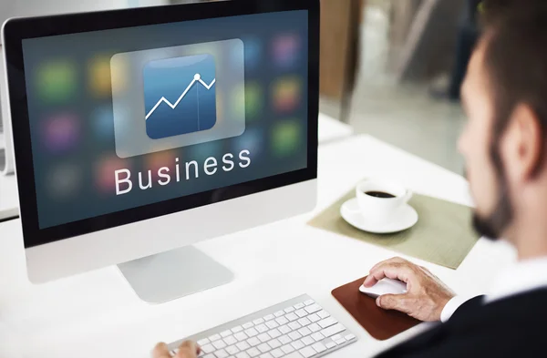 Computer met business op monitor — Stockfoto