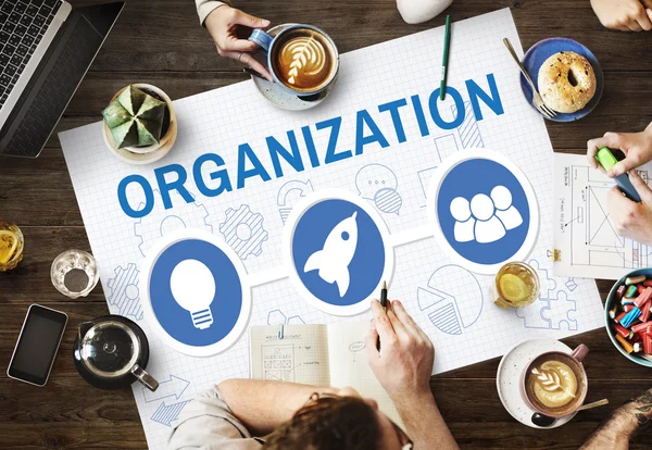Table with poster with Organization — Stock Photo, Image