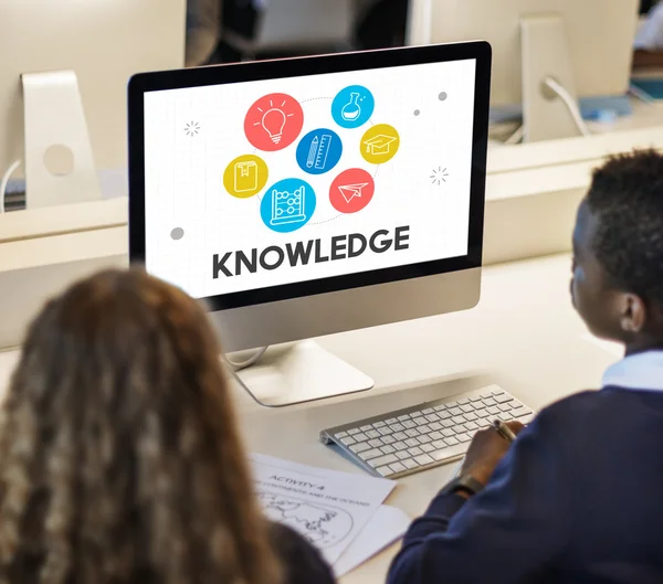 Classmate pupils using computer — Stock Photo, Image