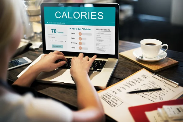 Woman working with computer in cafe — Stock Photo, Image